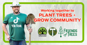 Timber Joey stands with a shovel in front of a transparent background of trees. To his right are the words "Working together to plant trees + grow community". Below the words are the logos for 2 Towns Ciderhouse, Timbers FC, and Friends of Trees. Campaign: Nature Never Stops.